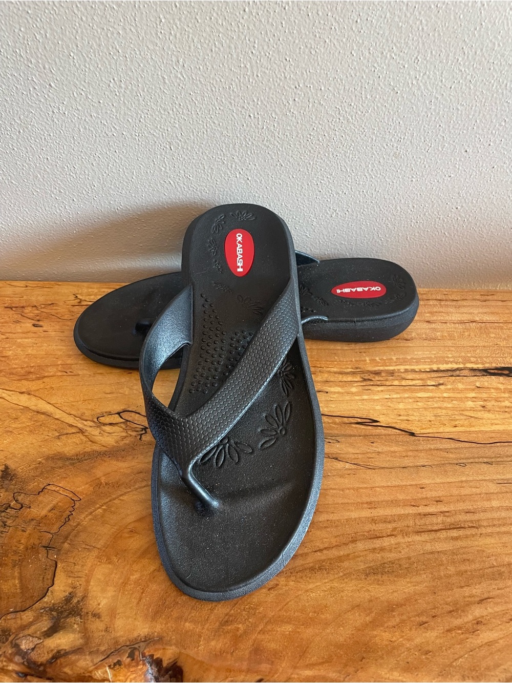 Okabashi Women’s Black Flip Flop Sandals with Red Logo